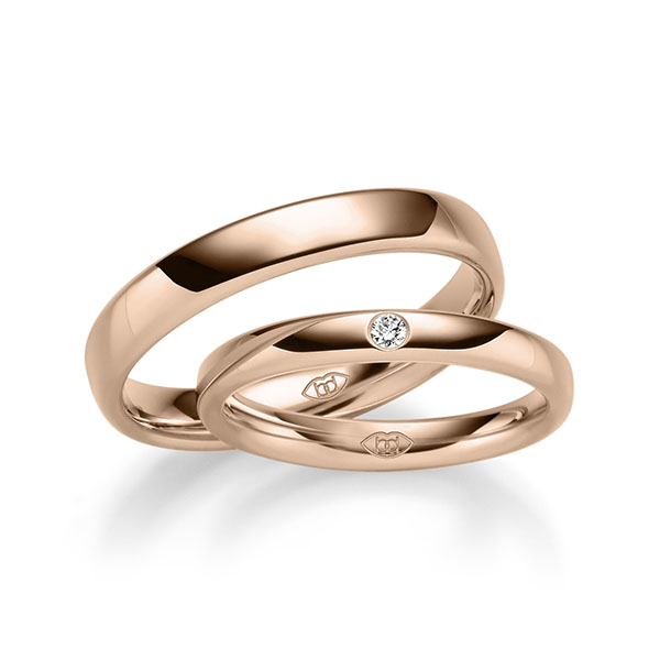 Paar klassische Trauringe/Eheringe in Rotgold 375 mit zus. 0,02 ct. Brillant tw, si 