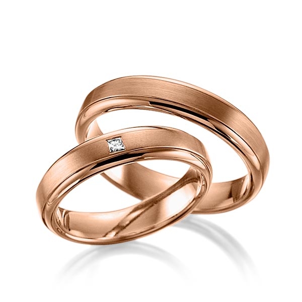 Paar klassische Trauringe/Eheringe in Rotgold 375 mit zus. 0,03 ct. Prinzess-Diamant tw, si 