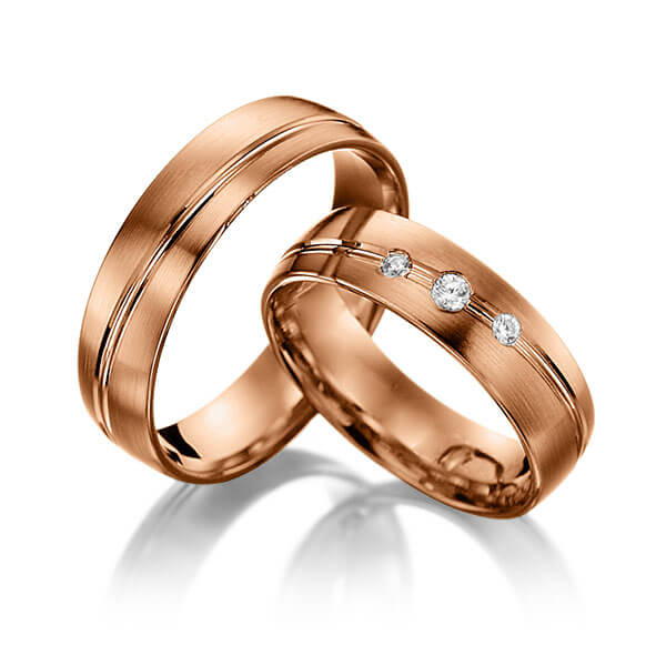 Paar klassische Trauringe/Eheringe in Rotgold 375 mit zus. 0,08 ct. Brillant tw, si von Steinberg