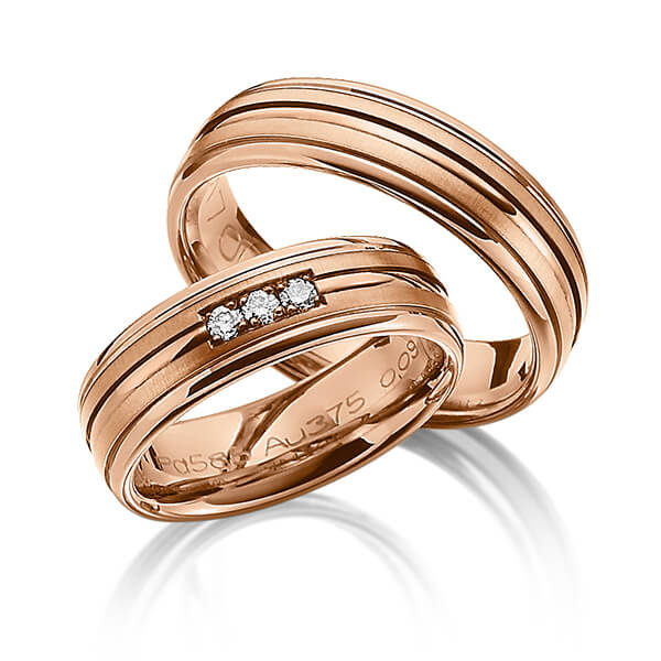 Paar klassische Trauringe/Eheringe in Rotgold 375 mit zus. 0,09 ct. Brillant tw, si von Merii - M-1103-11