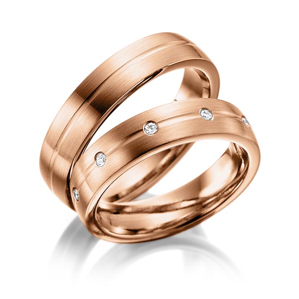 Paar klassische Trauringe/Eheringe in Rotgold 375 mit zus. 0,2 ct. Brillant tw, si von Steinberg