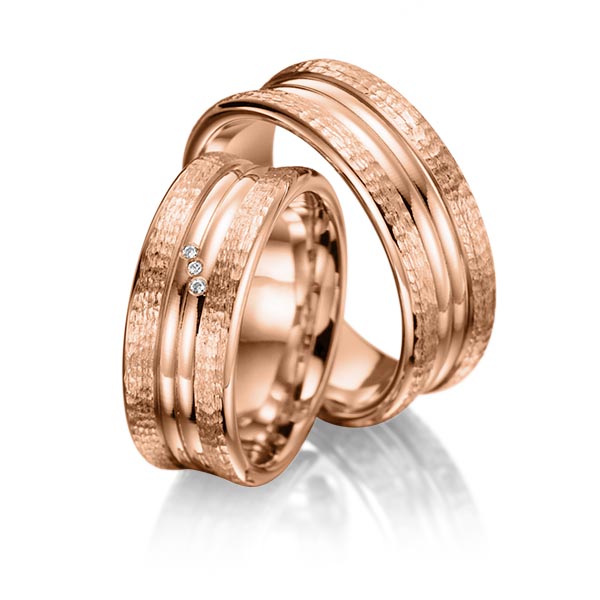 Paar klassische Trauringe/Eheringe in Rotgold 585 gehämmert Struktur, mit zus. 0,015 ct. Brillant tw, si von Merii