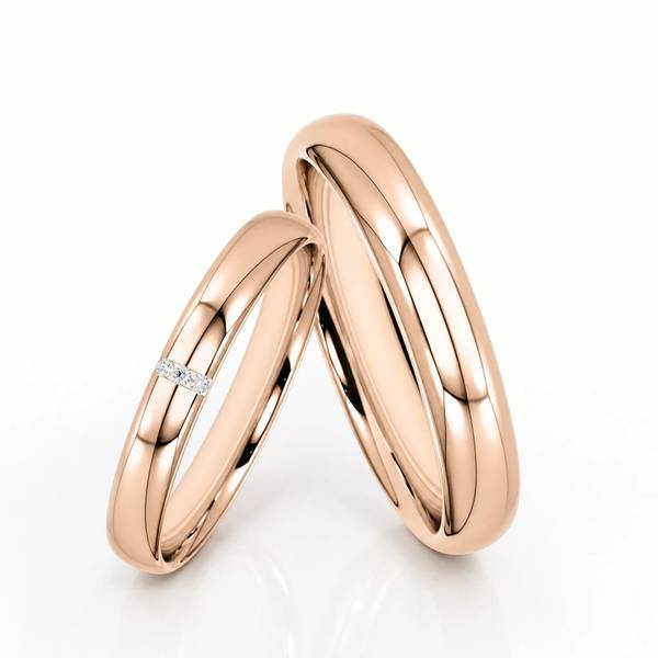 Paar klassische Trauringe/Eheringe in Rotgold 585 mit zus. 0,015 ct. Brillant von Steinberg
