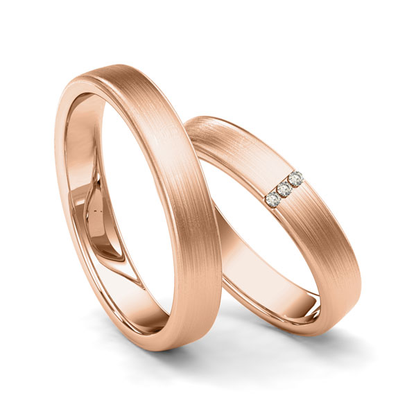 Paar klassische Trauringe/Eheringe in Rotgold 585 mit zus. 0,024 ct. Brillant tw, si von Merii