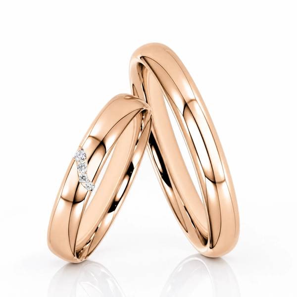 Paar klassische Trauringe/Eheringe in Rotgold 585 mit zus. 0,03 ct. Brillant von Steinberg
