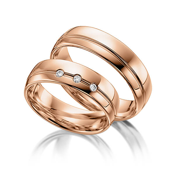 Paar klassische Trauringe/Eheringe in Rotgold 585 mit zus. 0,045 ct. Brillant tw, si von acredo