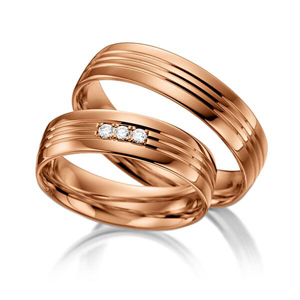 Paar klassische Trauringe/Eheringe in Rotgold 585 mit zus. 0,045 ct. Brillant tw, si von acredo