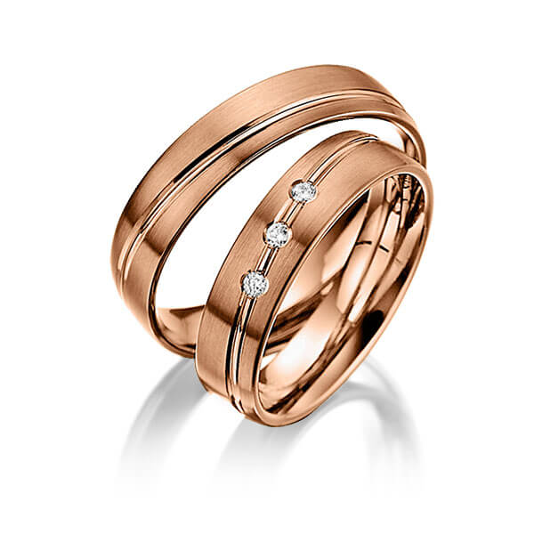 Paar klassische Trauringe/Eheringe in Rotgold 585 mit zus. 0,06 ct. Brillant tw, si von Steinberg