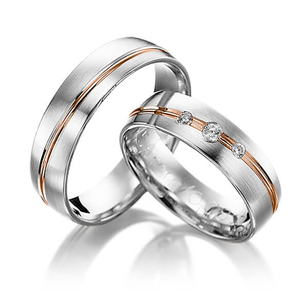 Paar klassische Trauringe/Eheringe in Rotgold 585 mit zus. 0,08 ct. Brillant tw, si 