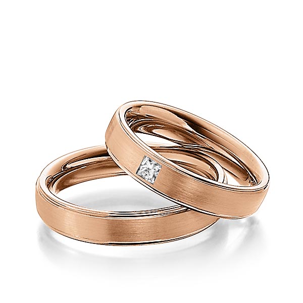 Paar klassische Trauringe/Eheringe in Rotgold 585 mit zus. 0,08 ct. Prinzess-Diamant tw, si von Steinberg