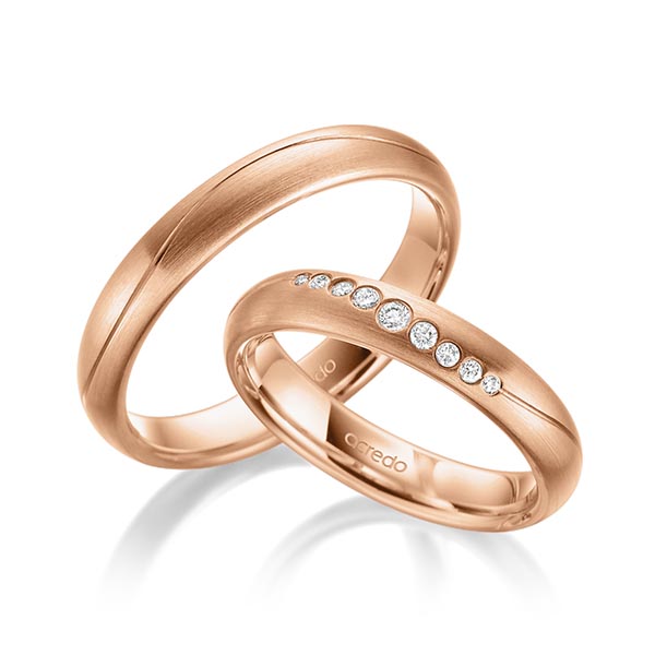 Paar klassische Trauringe/Eheringe in Rotgold 585 mit zus. 0,101 ct. Brillant tw, si von acredo