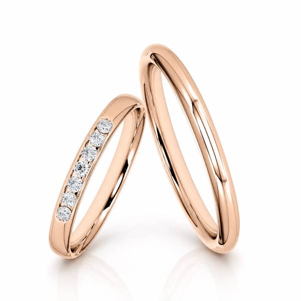 Paar klassische Trauringe/Eheringe in Rotgold 585 mit zus. 0,14 ct. Brillant von Steinberg