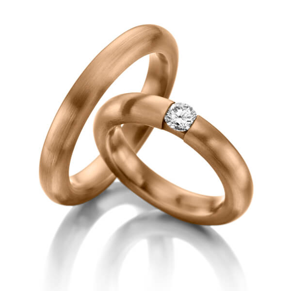 Paar klassische Trauringe/Eheringe in Rotgold 585 mit zus. 0,2 ct. Brillant tw, si von Steinberg