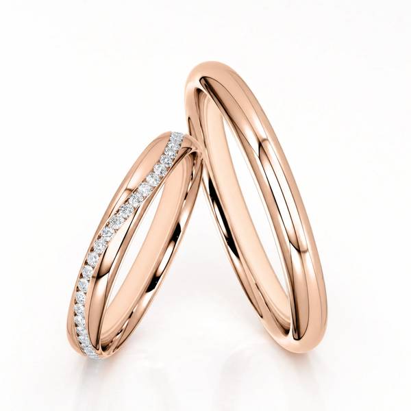 Paar klassische Trauringe/Eheringe in Rotgold 585 mit zus. 0,2 ct. Brillant von Steinberg