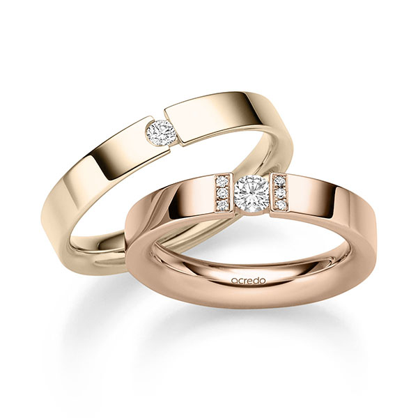 Paar klassische Trauringe/Eheringe in Rotgold 750 mit zus. 0,24 ct. Brillant tw, si von acredo