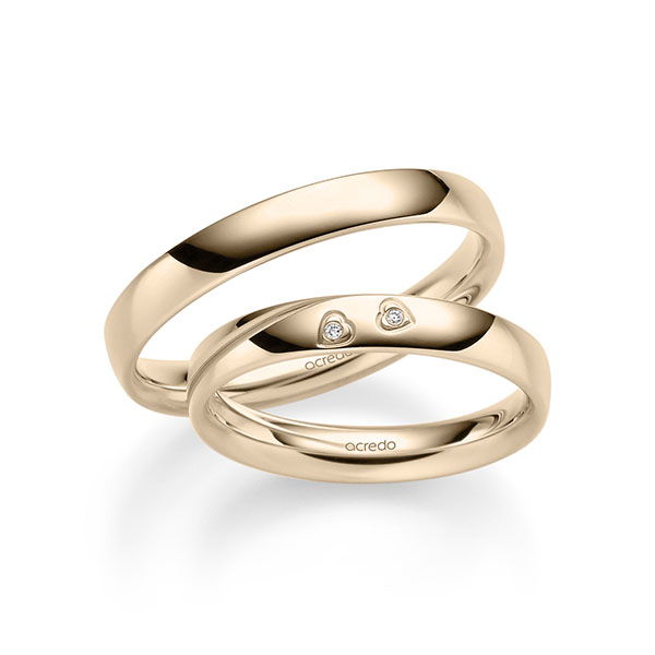 Paar klassische Trauringe/Eheringe in Signature Gold 585 mit zus. 0,01 ct. Brillant tw, si von acredo