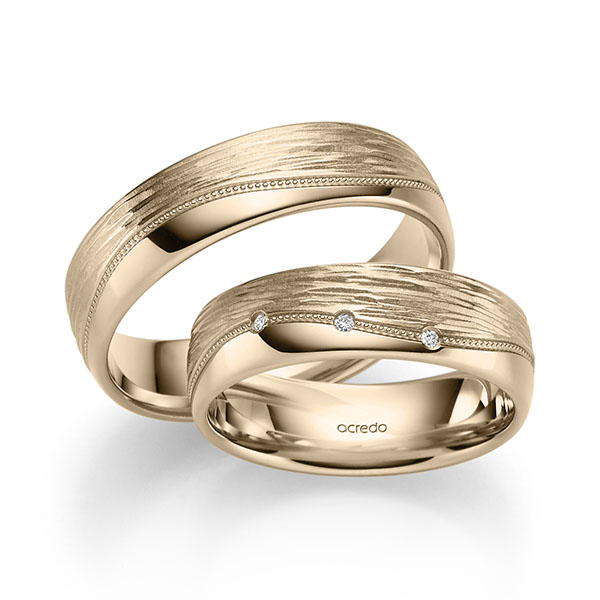 Paar klassische Trauringe/Eheringe in Signature Gold 585 mit zus. 0,09 ct. Brillant tw, si von acredo