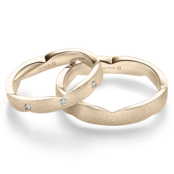 Paar klassische Trauringe/Eheringe in Signature Gold 585 mit zus. 0,12 ct. Brillant tw, si von acredo