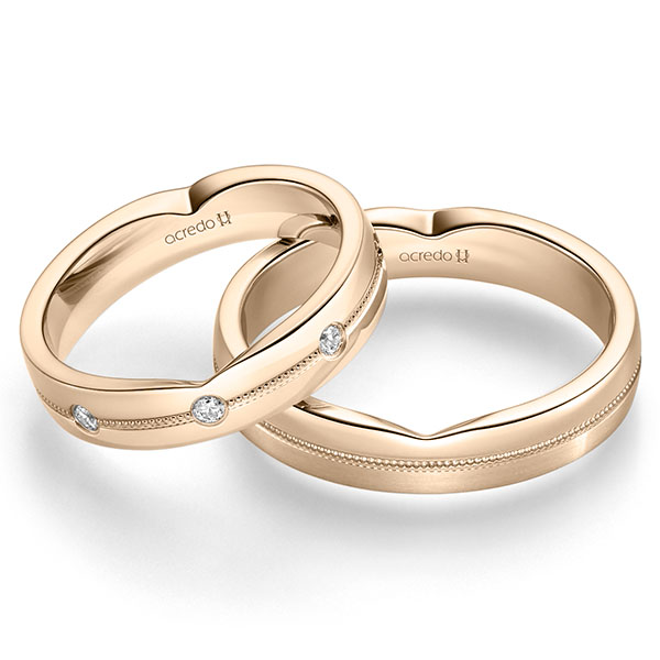 Paar klassische Trauringe/Eheringe in Signature Gold 585 mit zus. 0,24 ct. Brillant tw, si von acredo