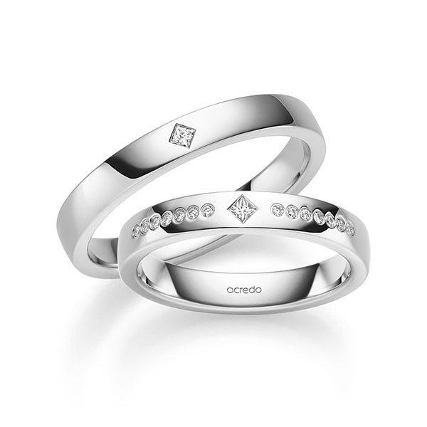 Paar klassische Trauringe/Eheringe in Weißgold 375 mit zus. 0,13 ct. Prinzess-Diamant & Brillant tw, vs von acredo - S-1375-1