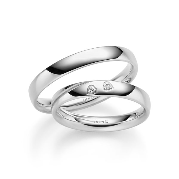 Paar klassische Trauringe/Eheringe in Weißgold 585 mit zus. 0,01 ct. Brillant tw, si von acredo