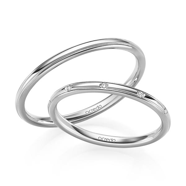 Paar klassische Trauringe/Eheringe in Weißgold 585 mit zus. 0,025 ct. Brillant tw, si von acredo