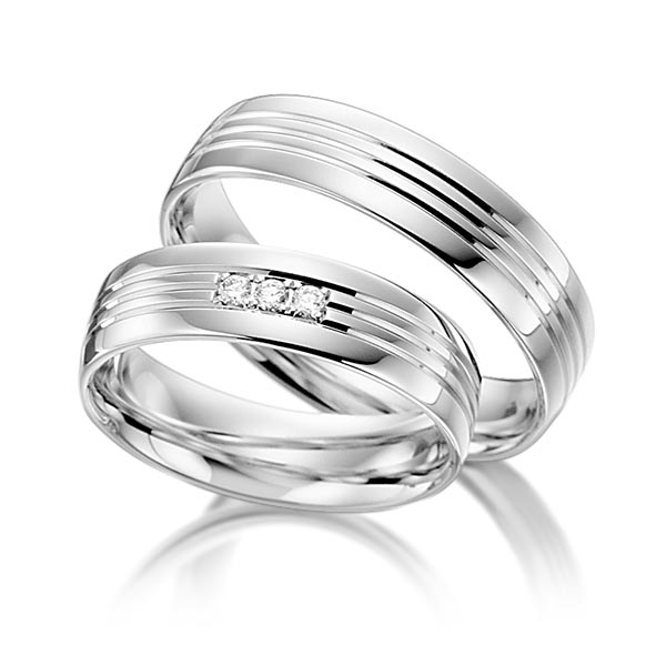 Paar klassische Trauringe/Eheringe in Weißgold 585 mit zus. 0,045 ct. Brillant tw, si von acredo