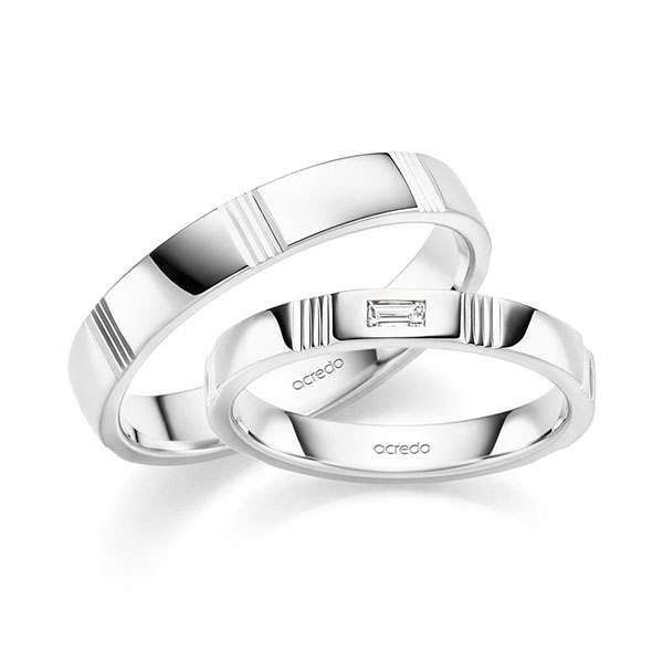 Paar klassische Trauringe/Eheringe in Weißgold 585 mit zus. 0,05 ct. Baguette-Diamant tw, vs von acredo