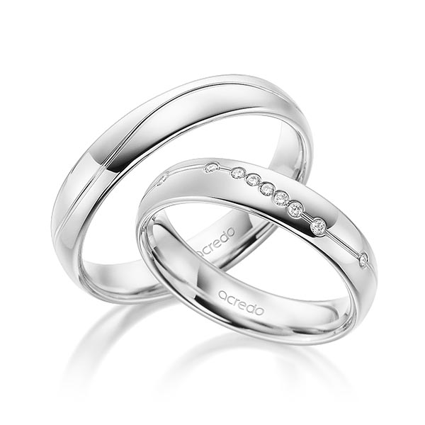 Paar klassische Trauringe/Eheringe in Weißgold 585 mit zus. 0,072 ct. Brillant tw, si von acredo