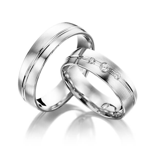 Paar klassische Trauringe/Eheringe in Weißgold 585 mit zus. 0,08 ct. Brillant tw, si von Steinberg - Q-1393-4