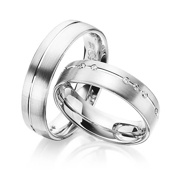 Paar klassische Trauringe/Eheringe in Weißgold 585 mit zus. 0,14 ct. Brillant tw, si von Steinberg