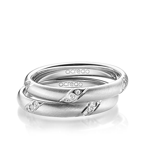 Paar klassische Trauringe/Eheringe in Weißgold 585 mit zus. 0,15 ct. Brillant tw, si von acredo