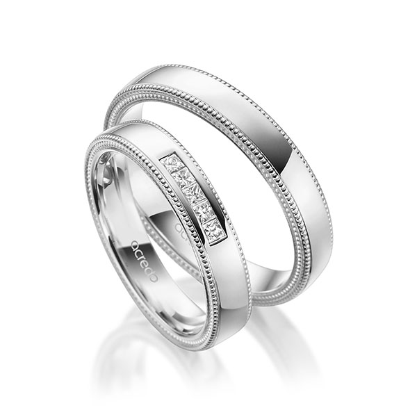 Paar klassische Trauringe/Eheringe in Weißgold 585 mit zus. 0,15 ct. Prinzess-Diamant tw, si von acredo