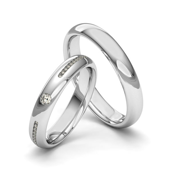 Paar klassische Trauringe/Eheringe in Weißgold 585 mit zus. 0,16 ct. Brillant tw, si von Merii