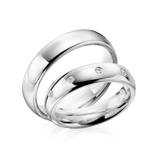 Paar klassische Trauringe/Eheringe in Weißgold 585 mit zus. 0,1 ct. Brillant tw, si von Steinberg