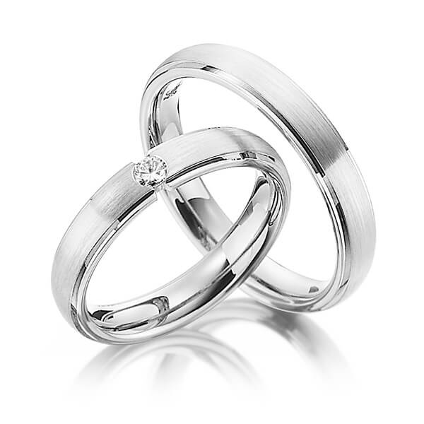 Paar klassische Trauringe/Eheringe in Weißgold 585 mit zus. 0,1 ct. Brillant tw, si von Steinberg