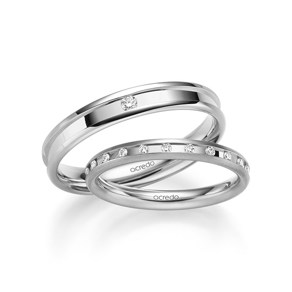 Paar klassische Trauringe/Eheringe in Weissgold 585 mit zus. 0,26 ct. Brillant tw, si von acredo