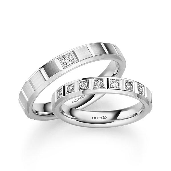 Paar klassische Trauringe/Eheringe in Weißgold 585 mit zus. 0,2 ct. Brillant tw, si von acredo