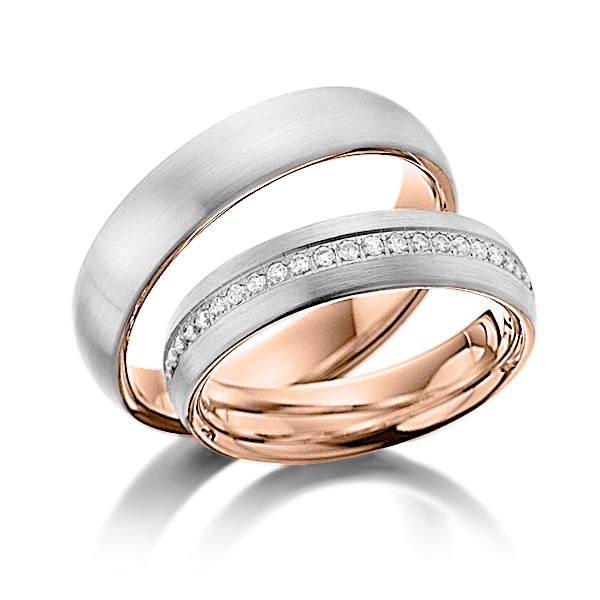 Set Bicolor Memoire-trouwringen in buiten grijsgoud 14 kt. , binnen roodgoud 14 kt. half gezet met in totaal 0,23 ct. Briljant tw/si van Steinberg