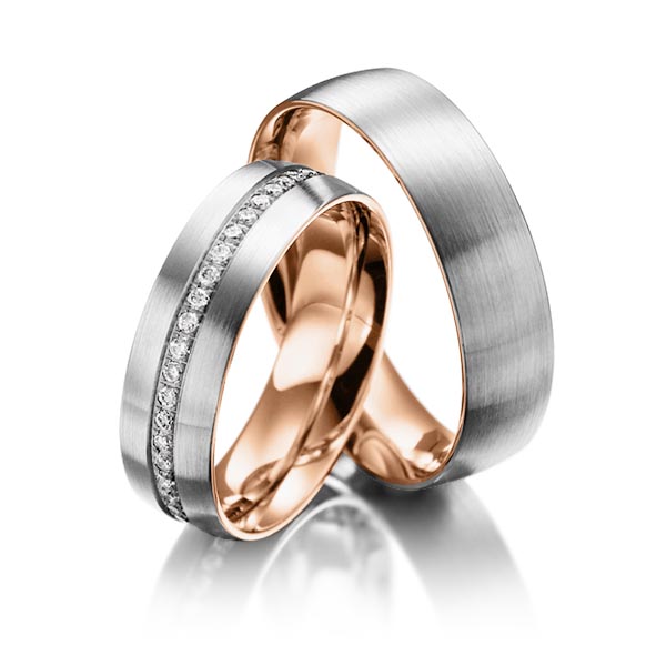 Set Bicolor Memoire-trouwringen in buiten grijsgoud 14 kt. , binnen roodgoud 14 kt. half gezet met in totaal 0,23 ct. Briljant tw/si van Steinberg