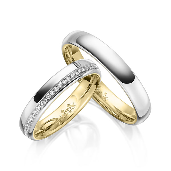 Set Bicolor Memoire-trouwringen in buiten witgoud 14 kt. , binnen geelgoud 14 kt. half gezet met in totaal 0,14 ct. Briljant tw/si van Steinberg