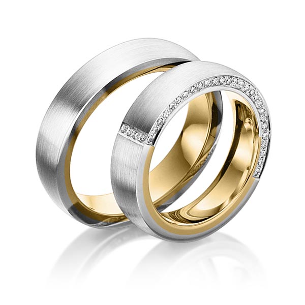 Set Bicolor Memoire-trouwringen in buiten witgoud 14 kt. , binnen geelgoud 14 kt. half gezet met in totaal 0,3 ct. Briljant tw/si van Steinberg