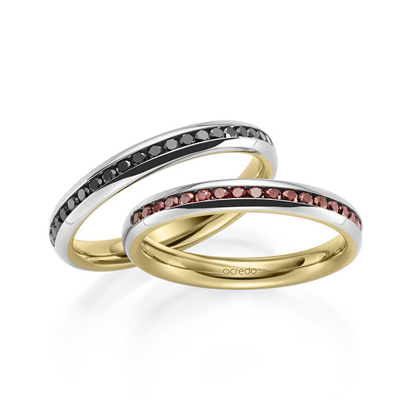 Set Bicolor Memoire-trouwringen in buiten witgoud 14 kt. , binnen geelgoud 14 kt. half gezet met in totaal 0,6 ct. Briljant Red Cherry Zwart van acredo