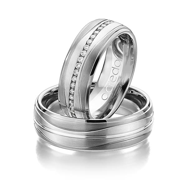 Set Bicolor Memoire-trouwringen in dark grey gold 14 kt. witgoud 14 kt. volledig gezet met in totaal 0,46 ct. Briljant tw/si van acredo