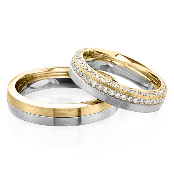 Set Bicolor Memoire-trouwringen in geelgoud 14 kt. grijsgoud 14 kt. volledig gezet met in totaal 0,72 ct. Briljant tw/si van Steinberg