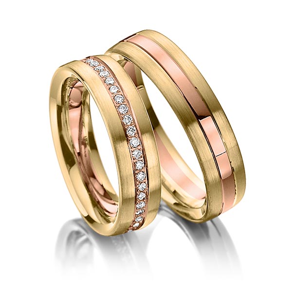 Set Bicolor Memoire-trouwringen in geelgoud 14 kt. roodgoud 14 kt. volledig gezet met in totaal 0,48 ct. Briljant tw/si van Steinberg