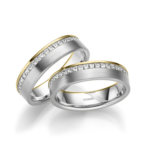 Set Bicolor Memoire-trouwringen in geelgoud 14 kt. witgoud 14 kt. half gezet met in totaal 1,08 ct. Princess-Diamant tw/si van acredo