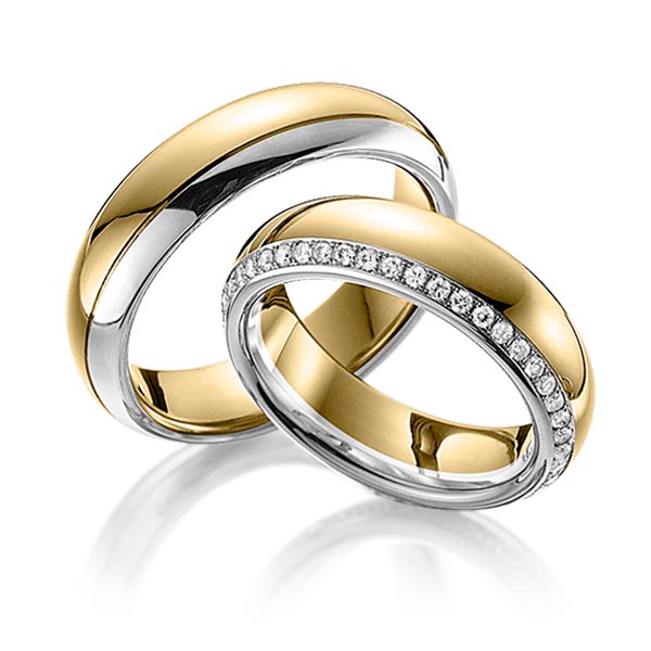 Set Bicolor Memoire-trouwringen in geelgoud 14 kt. witgoud 14 kt. volledig gezet met in totaal 0,47 ct. Briljant tw/si van Eternal Touch