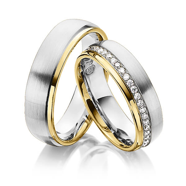 Set Bicolor Memoire-trouwringen in geelgoud 14 kt. witgoud 14 kt. volledig gezet met in totaal 0,47 ct. Briljant tw/si van Steinberg