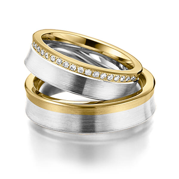 Set Bicolor Memoire-trouwringen in geelgoud 14 kt. witgoud 14 kt. volledig gezet met in totaal 0,48 ct. Briljant tw/si van Steinberg
